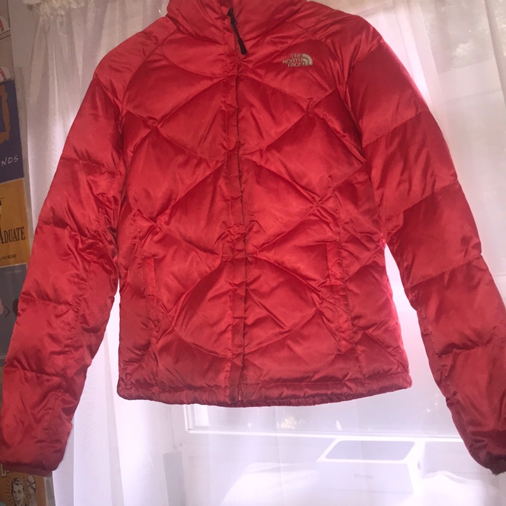 Salmon colored north face winter jacket